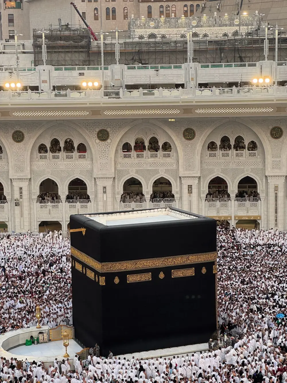 Pilgrims performing tawaf around the Kaaba at Al-Masjid al-Haram in Makkah